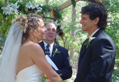 Charles officiating at his daughter's Lindsey's wedding in June of 2006